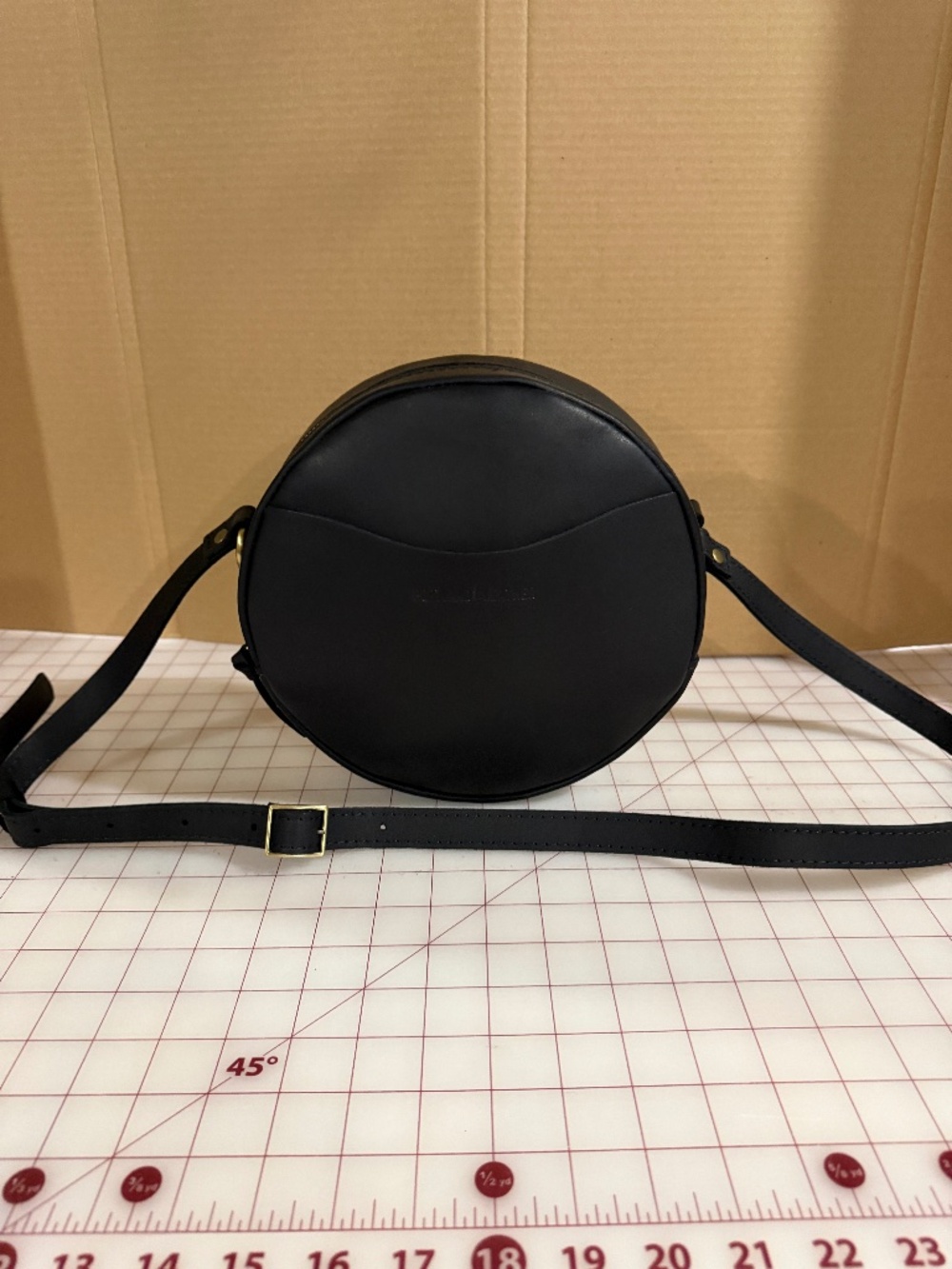 Portland Leather large round crossbody bag.